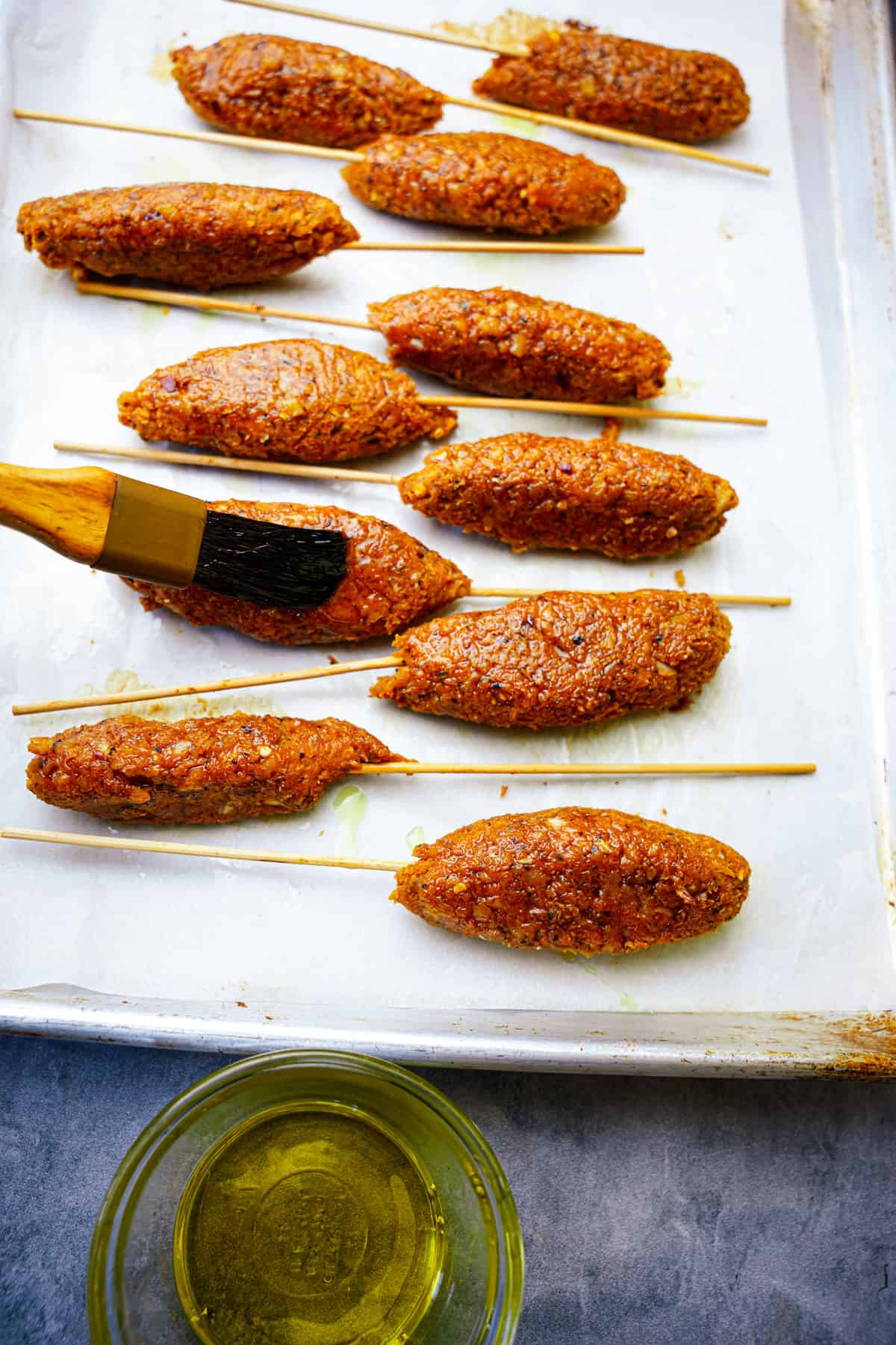 vegan kofta is brushed with olive oil.