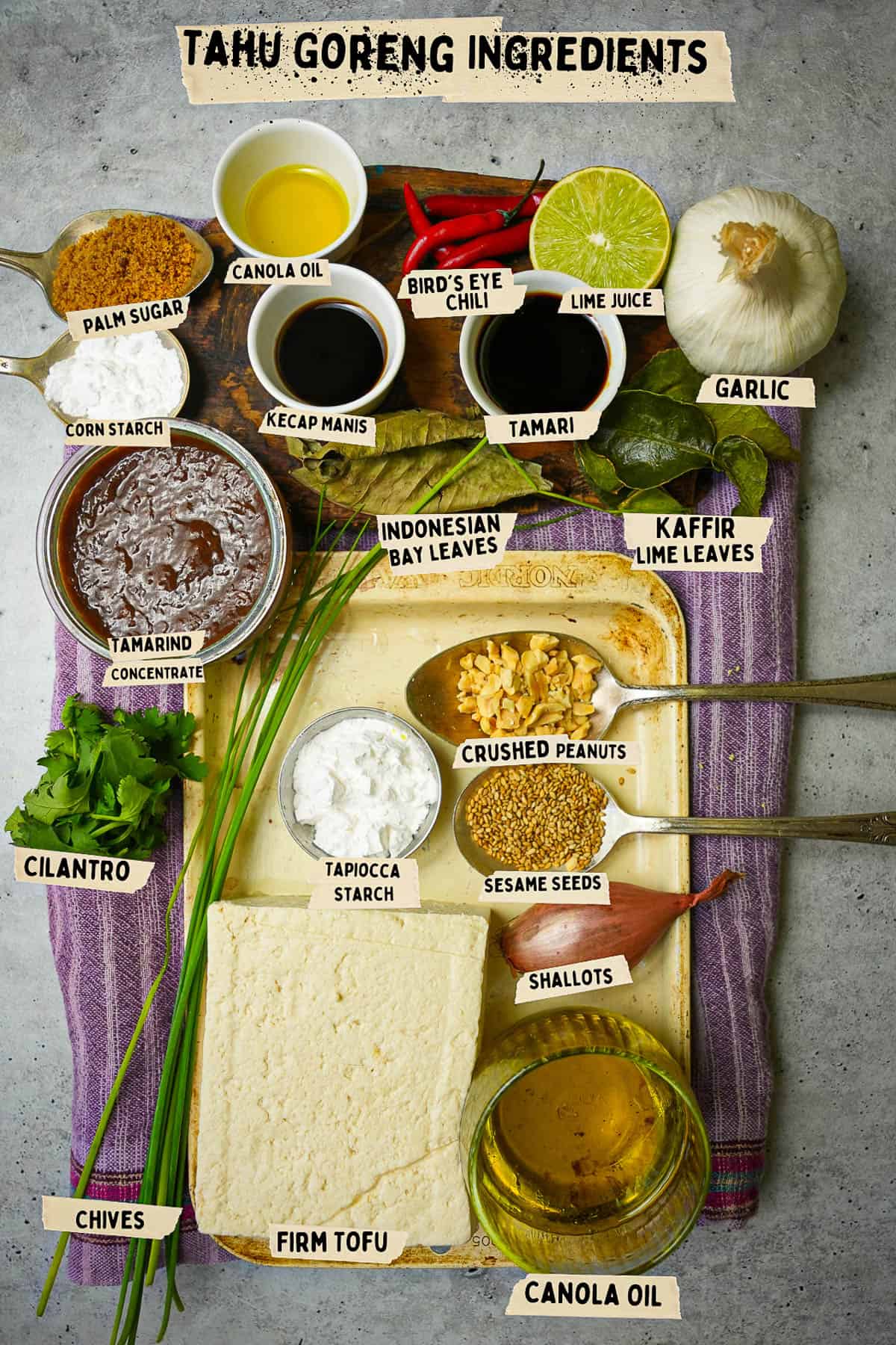 A table of ingredients measured out for tahu goreng.