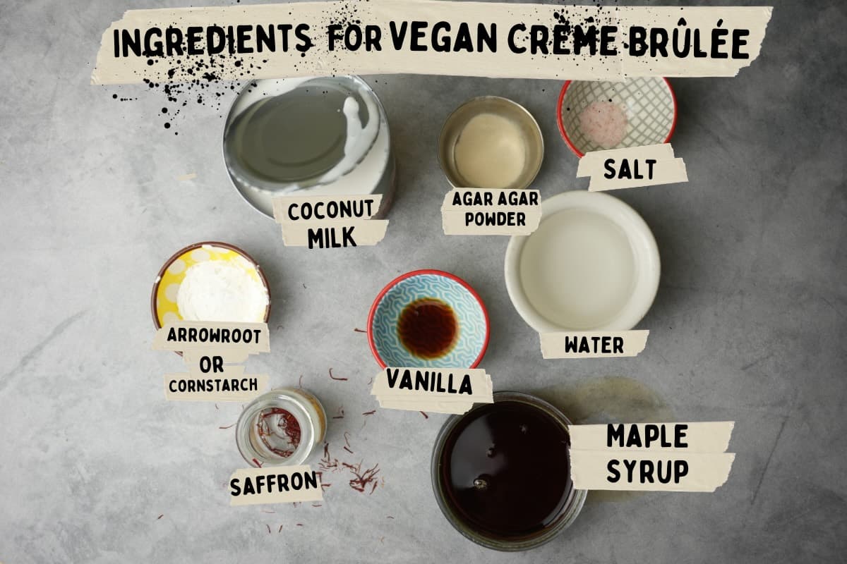 Ingredients measured out for vegan creme brulee on a stone background in little cups.