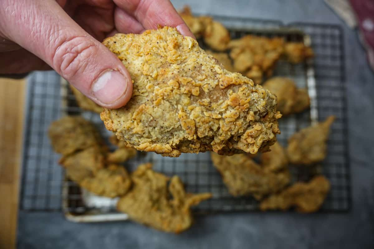 a close of up the texture of the batter-fried seitan. You can see all the crunchy nooks and crannies.