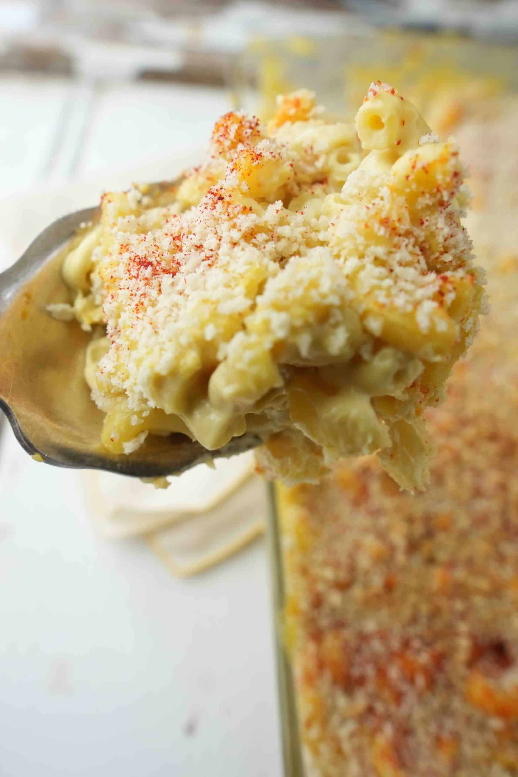 vegan macaroni and cheese on a spoon.