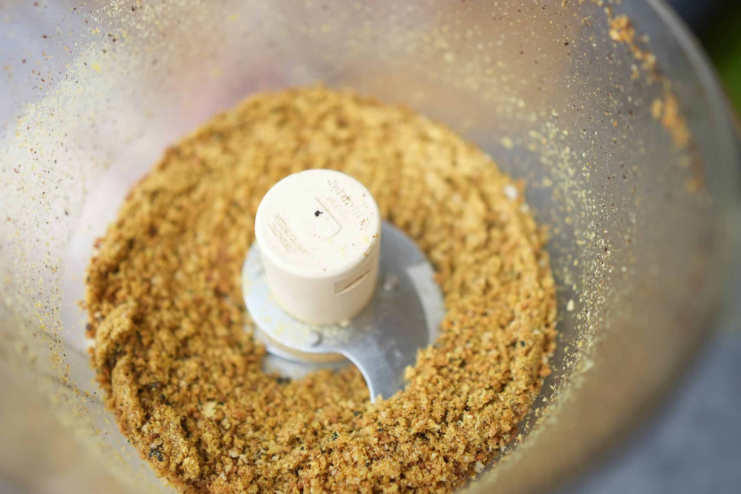 the roasted nuts all ground up in a food processor with nutritional yeast, bread crumbs, salt and asafoetida. 