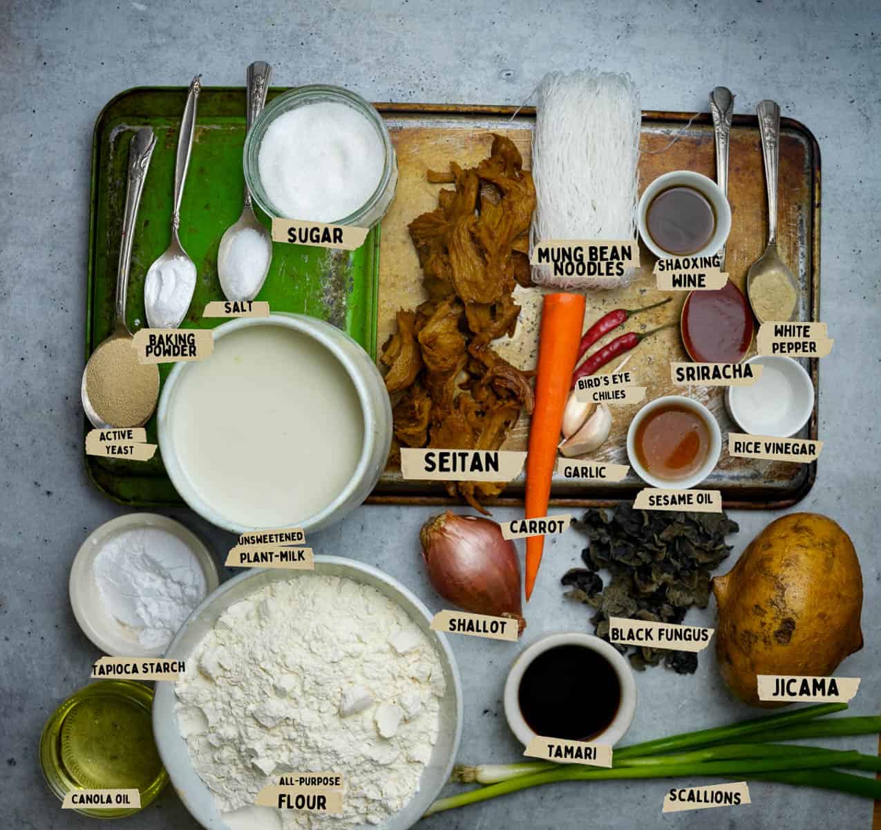 The ingredients for making banh bao are laid out on a table.