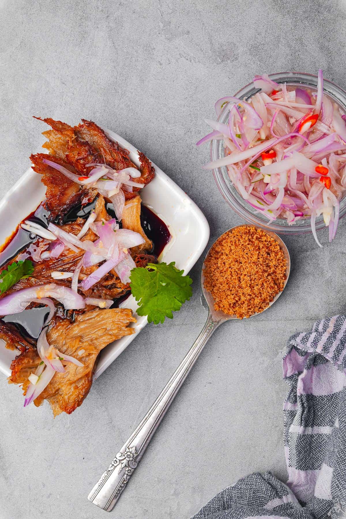 A plate of seitan in kecap manis with sambal matah.