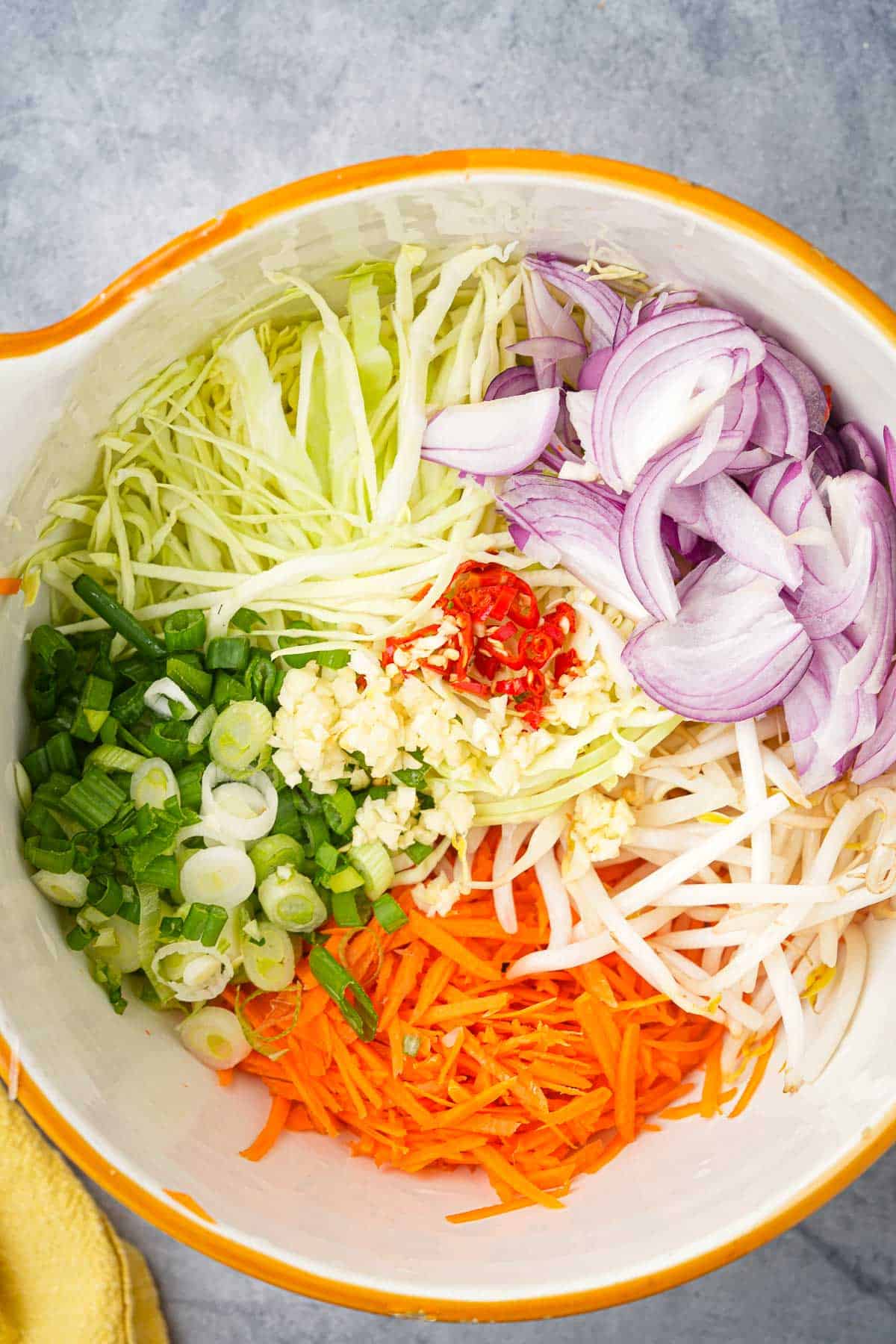 A bowl full of prepped veggies.