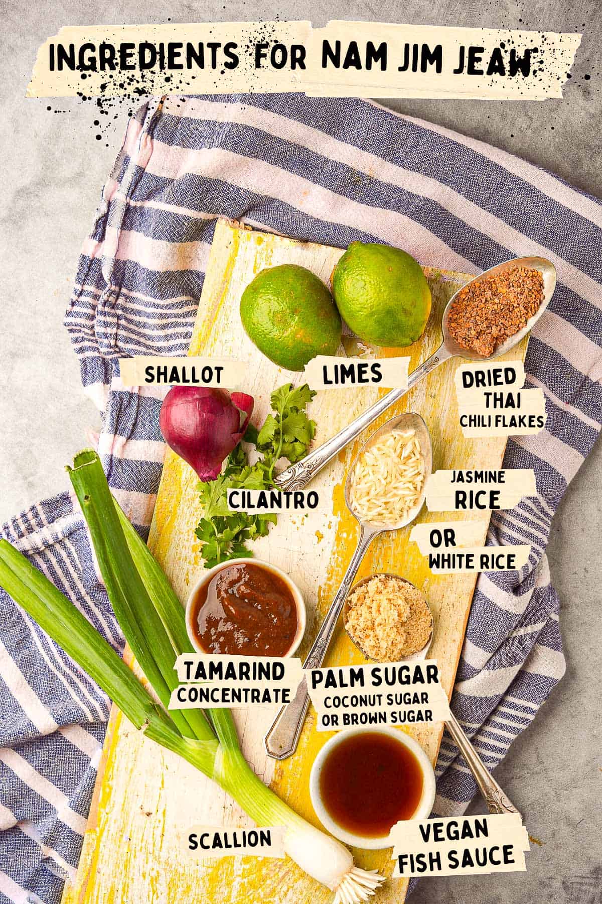 Ingredients for nam jim jeaw on a wooden board
