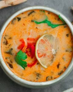 Thai curry soup in a bowl on a table.