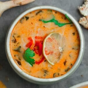 Thai curry soup in a bowl on a table.