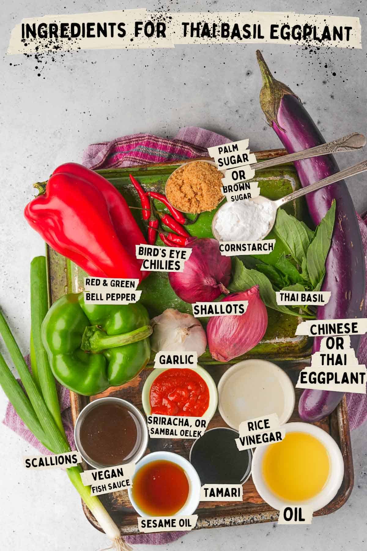 Ingredients for Thai basil eggplant on a metal tray.