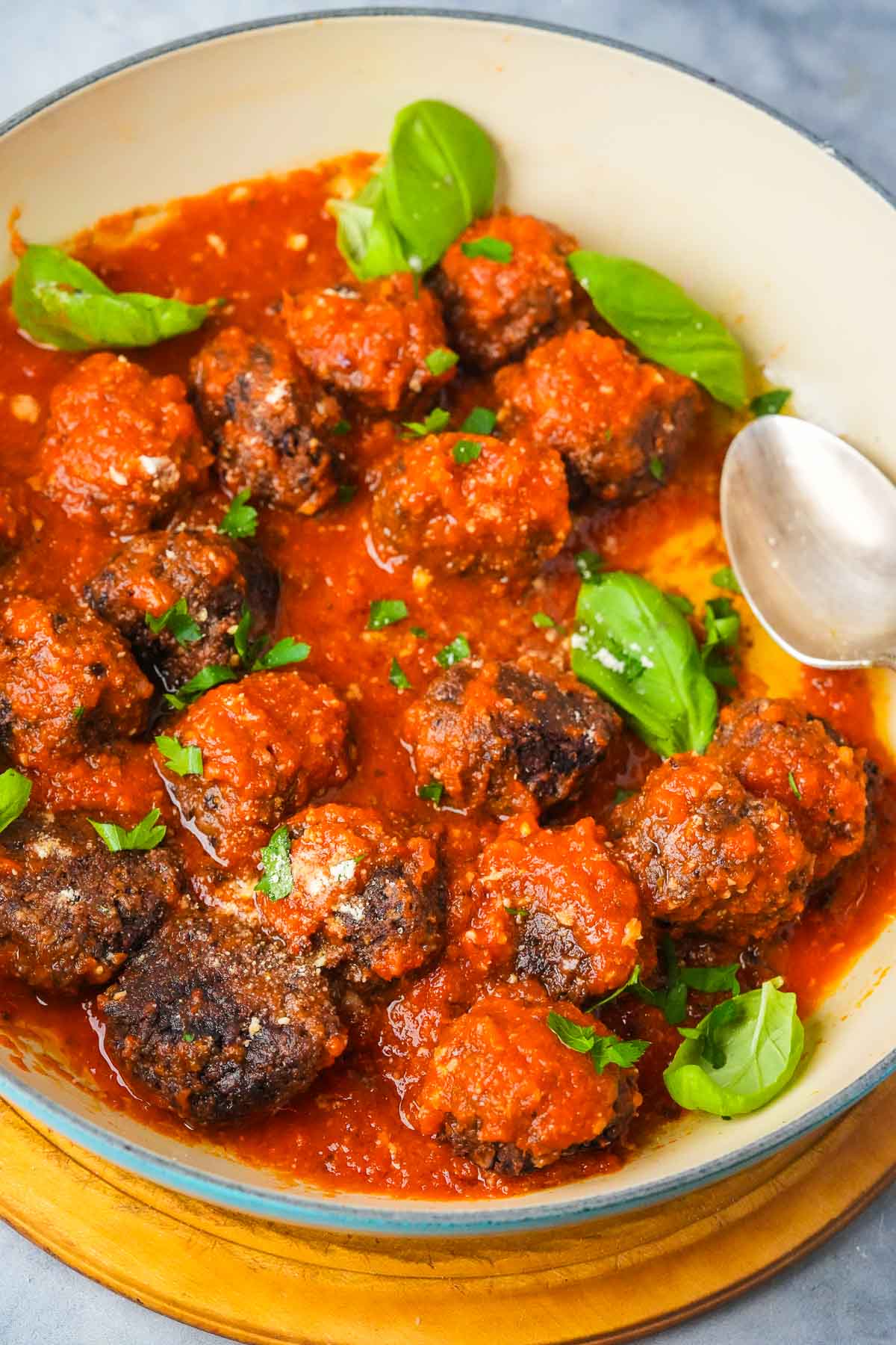 Vegan meatballs in tomato sauce in a bowl.