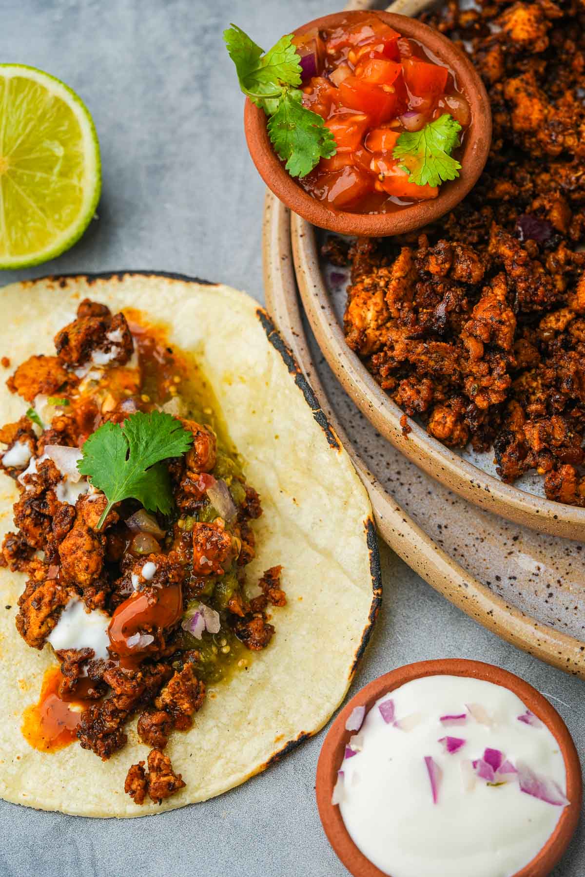 Mexican tacos with vegan chorizo, guacamole and sour cream.