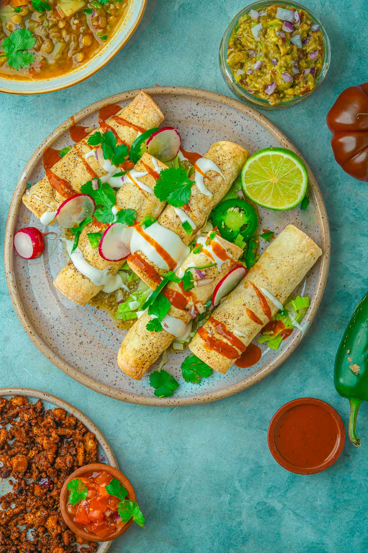 A plate of Vegan Taquitos on a table.