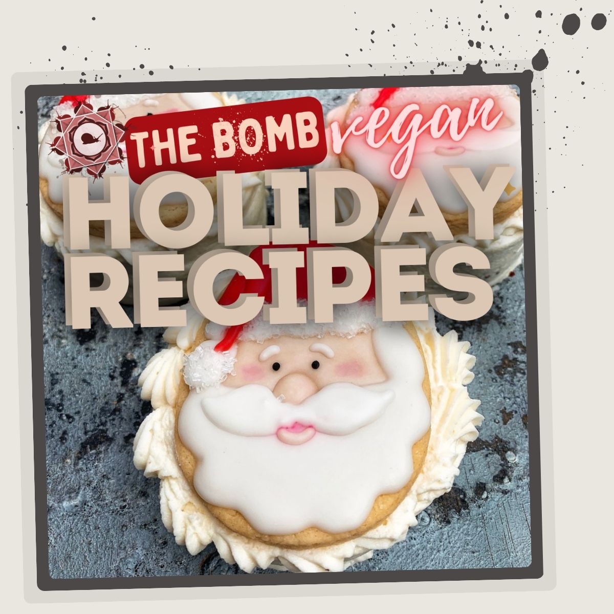 Cookies decorated as Santa Claus are visible beneath layered text reading "The Bomb Vegan Holiday Recipes.