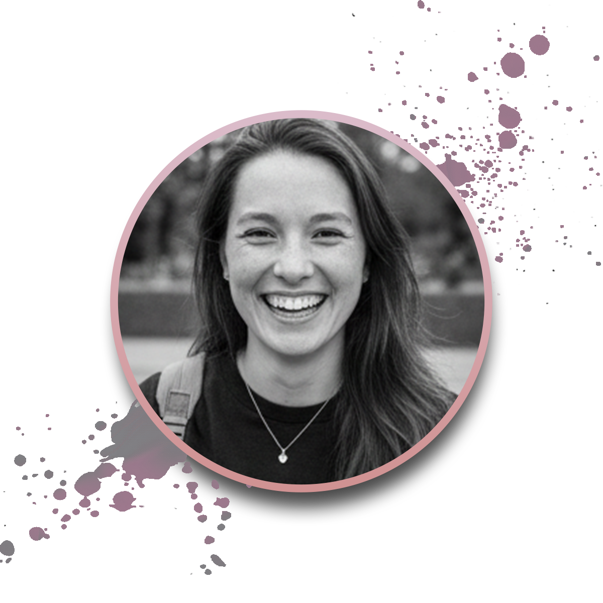 A black and white portrait of a smiling young woman with long hair, wearing a necklace and a backpack. The image is framed by a pink circle with purple paint splatters on a white background.