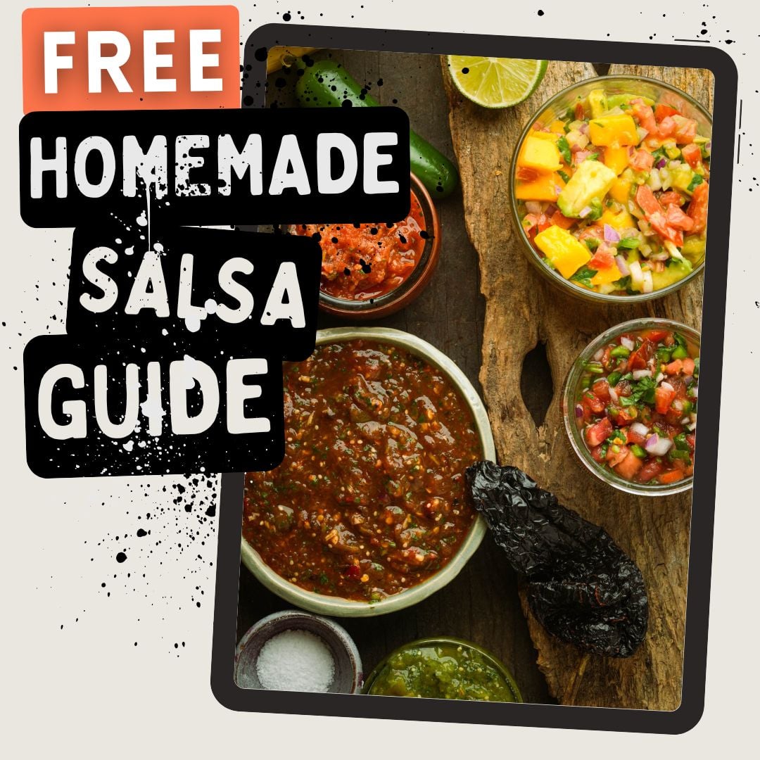 Overhead view of assorted salsas in bowls with ingredients on a wooden board. Text reads: FREE HOMEMADE SALSA GUIDE in bold letters.