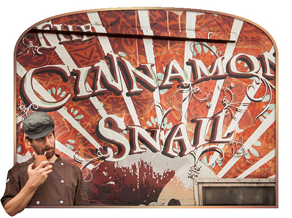 Chef Adam Sobel in front of the original Cinnamon Snail food truck