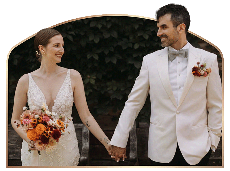 Juliana and Michael holding hands on their wedding day