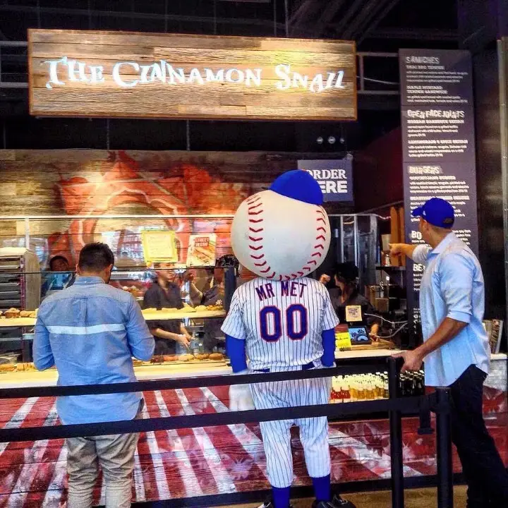 Mr. Met visiting the Cinnamon Snail counter