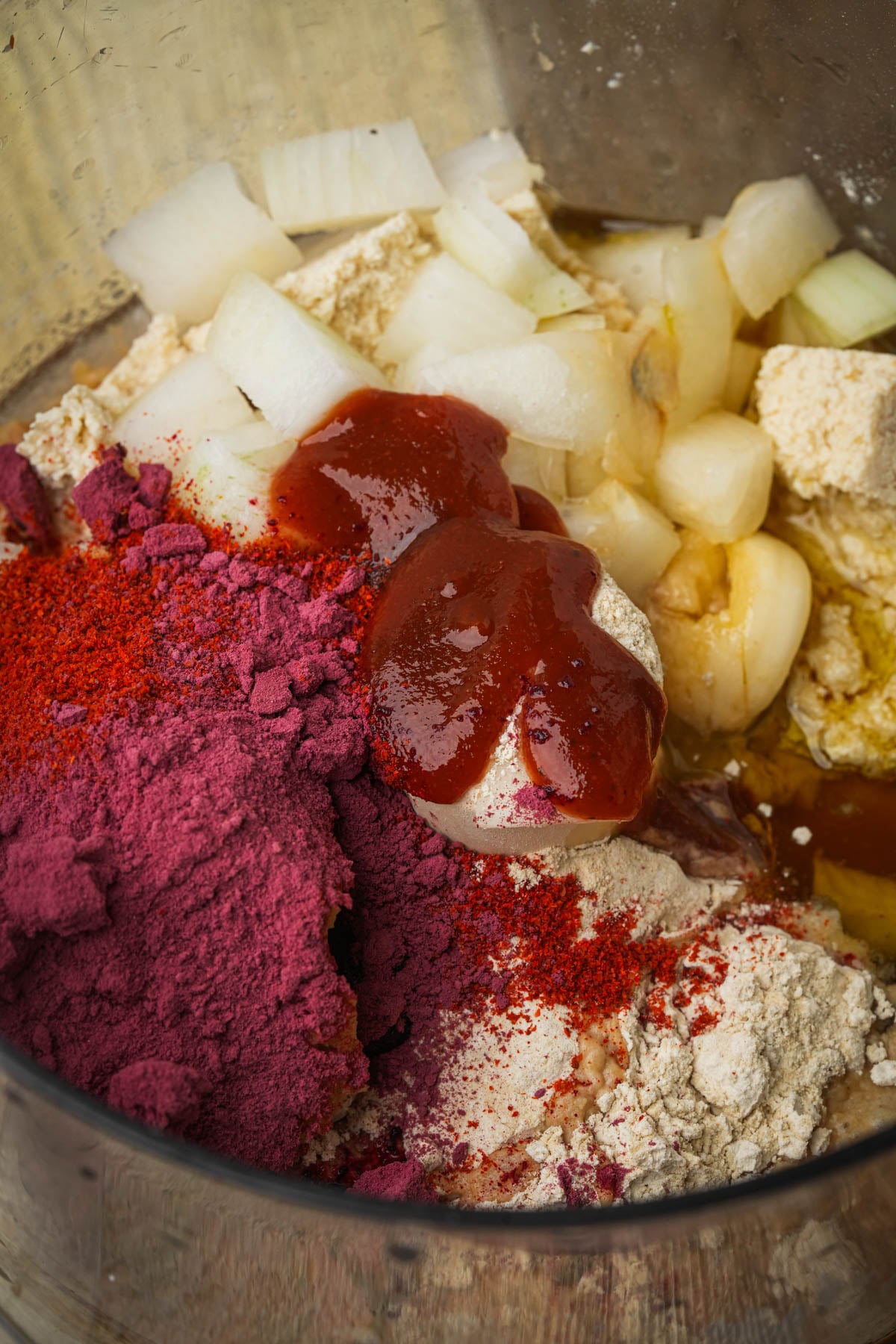 Tofu, onion, garlic, BBQ sauce, beet powder and smoked paprika in a food processor for the meat dough.